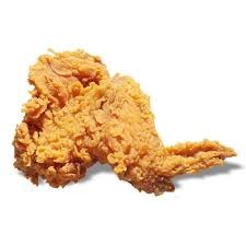 A close-up of a paper filter filled with ground coffee